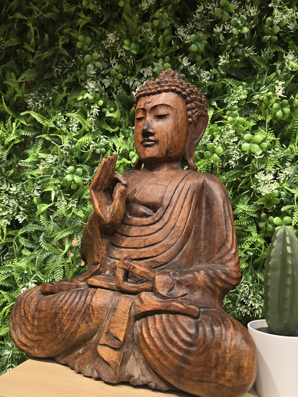 Carved Wooden Buddha Sculpture in Warm Brown Finish